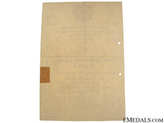 An Award Document For A German Cross In Gold