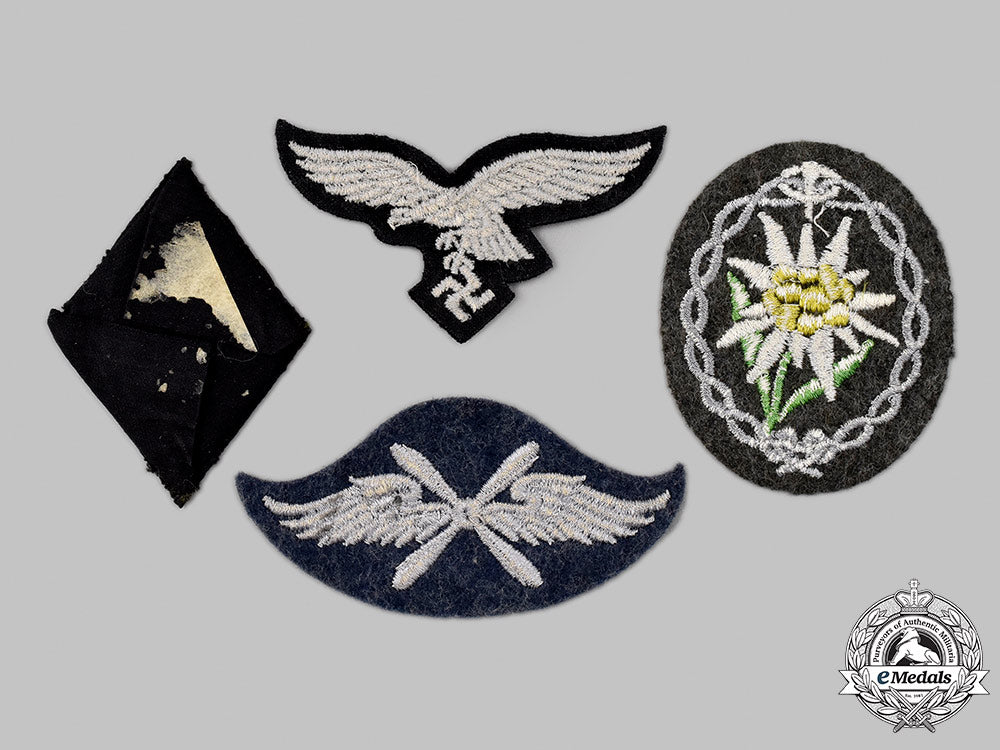 germany,_third_reich._a_mixed_lot_of_uniform_insignia_112_m21_mnc9688_1