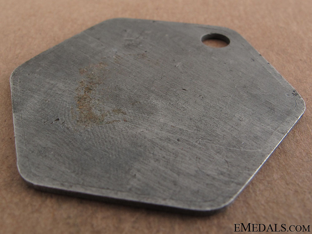 daimler-_benz_worker’s_numbered_id_tag_12.jpg51361d3feca5e