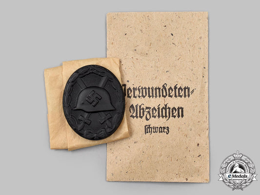 germany,_wehrmacht._a_mint_and_unissued_black_grade_wound_badge,_by_heinrich_wander_19_m21_mnc4581