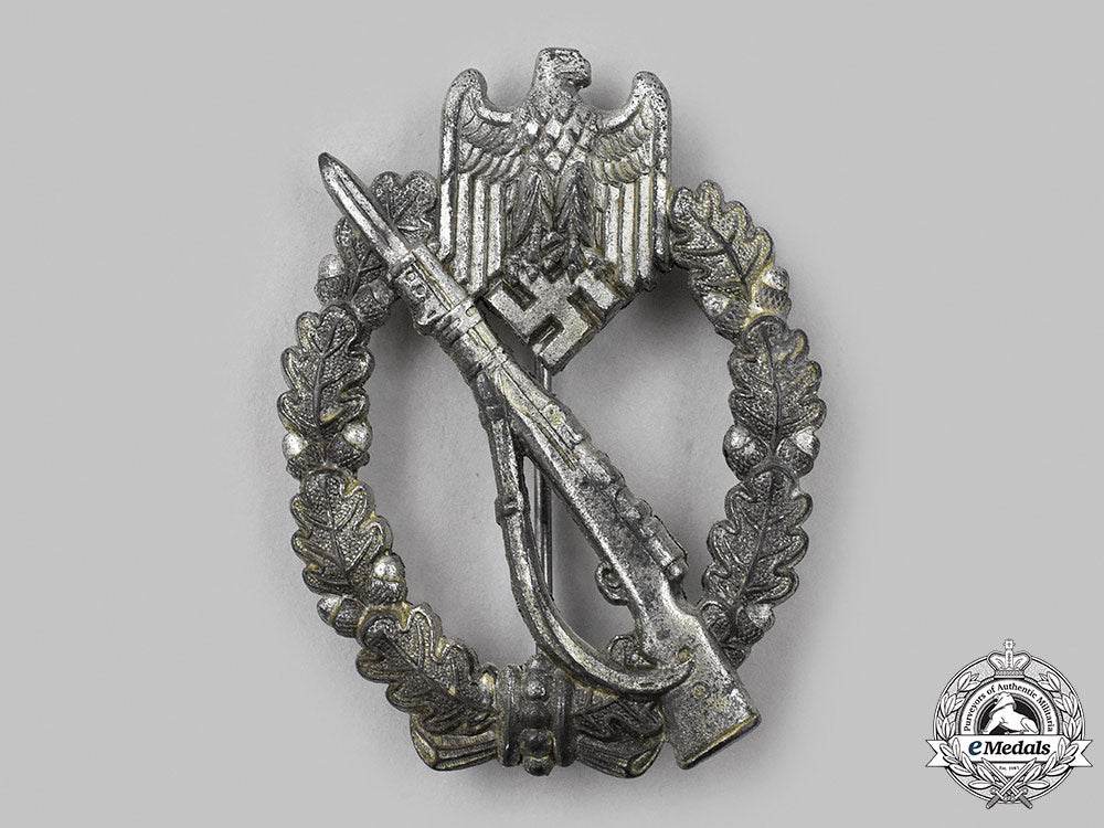 germany,_wehrmacht._an_infantry_assault_badge,_silver_grade,_by_julius_bauer&_co._27_m21_mnc3255_1