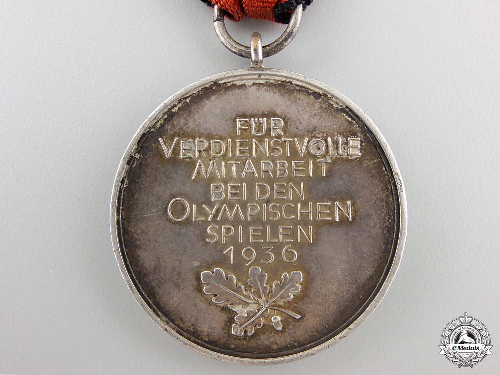 a1936_berlin_summer_olympic_games_medal_with_case_38.jpg55bd0336354c9