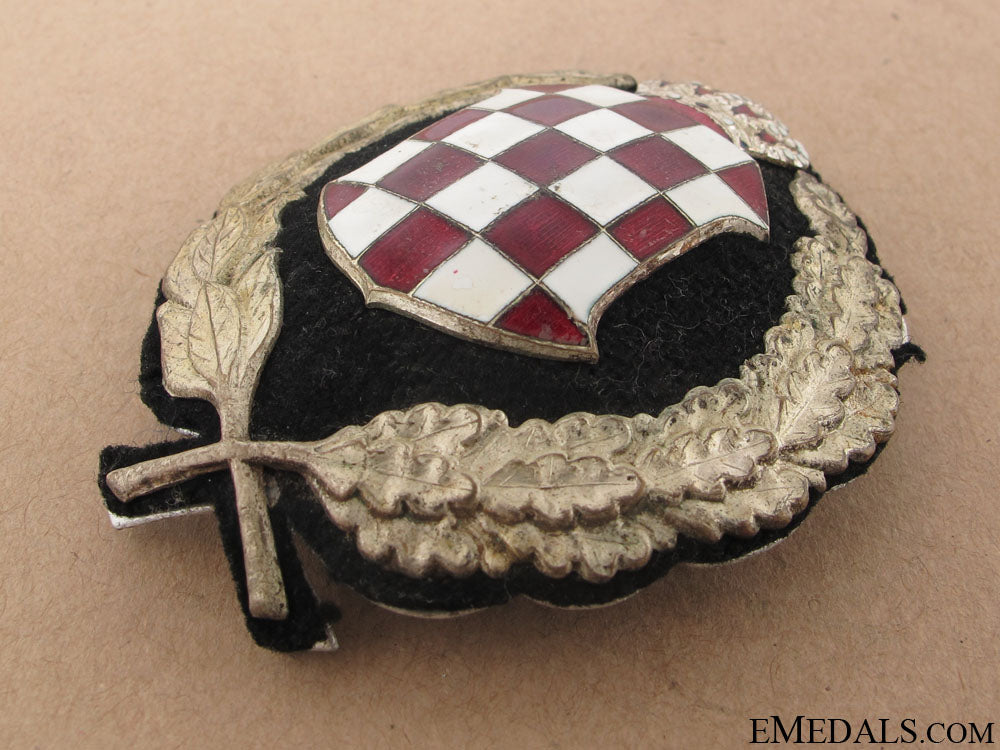 banovina_of_croatia(1939-1941)-_police_cap_badge_47.jpg50ba22dedfa4a