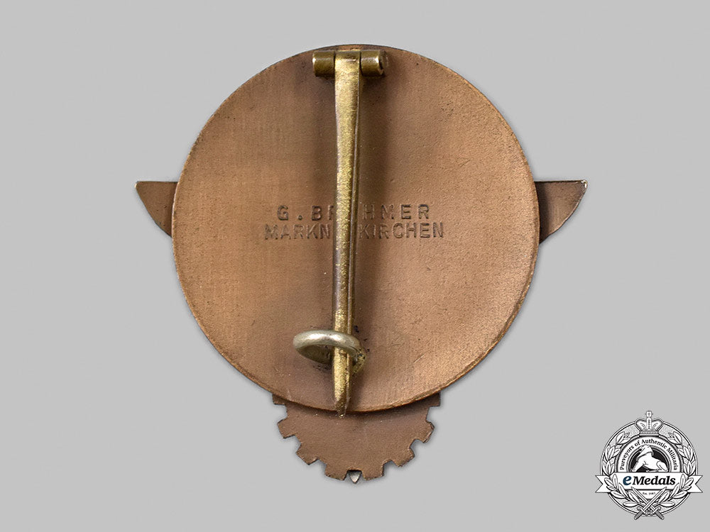 germany,_hj._a1938_national_trade_competition_victor’s_badge,_bronze_grade,_by_gustav_brehmer_60_m21_mnc5867
