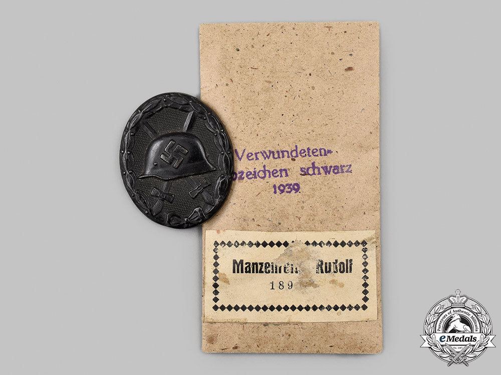germany,_wehrmacht._an_owner-_attributed_black_grade_wound_badge,_by_carl_wild_67_m21_mnc3033