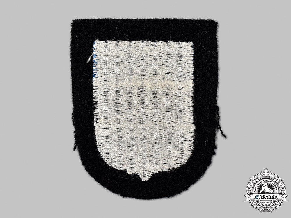 germany,_ss._a_waffen-_ss_estonian_volunteer’s_sleeve_shield_71_m21_mnc1568_1