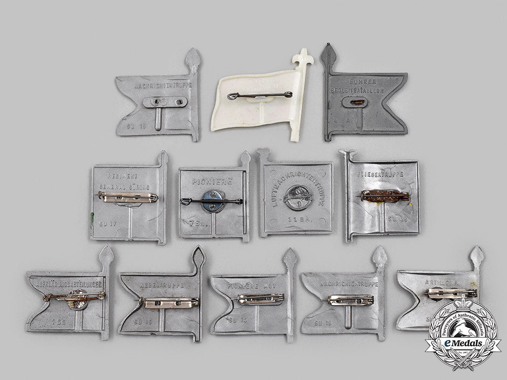 germany,_third_reich._a_lot_of_winterhilfswerk_wehrmacht_standard_donation_badges_88_m21_mnc7840_1