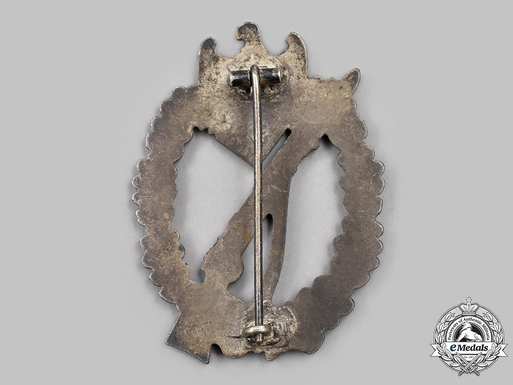 germany,_wehrmacht._an_infantry_assault_badge,_silver_grade,_by_carl_wild_90_m21_mnc6229