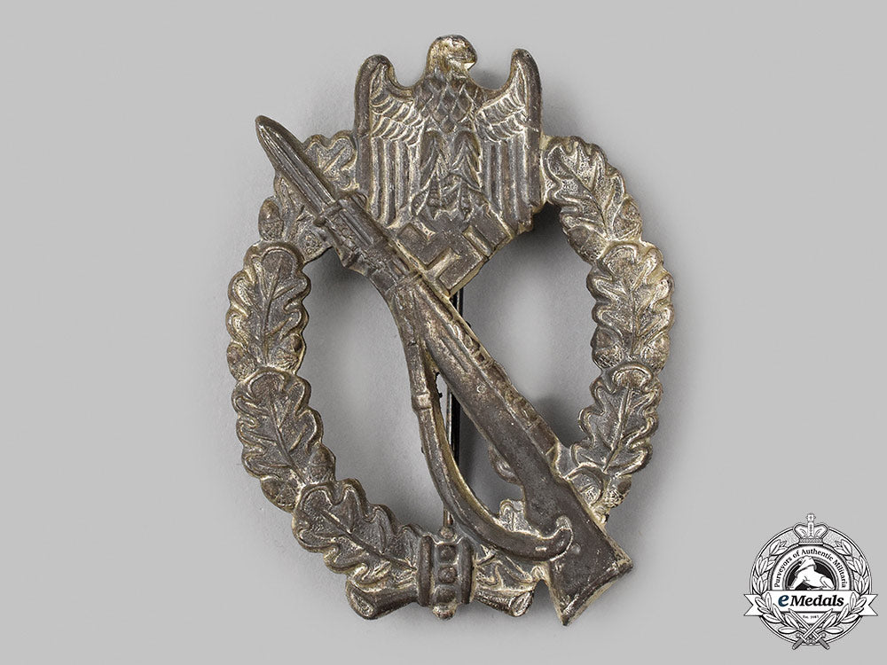 germany,_wehrmacht._an_owner-_attributed_infantry_assault_badge,_silver_grade,_by_rudolf_souval_93_m21_mnc3062