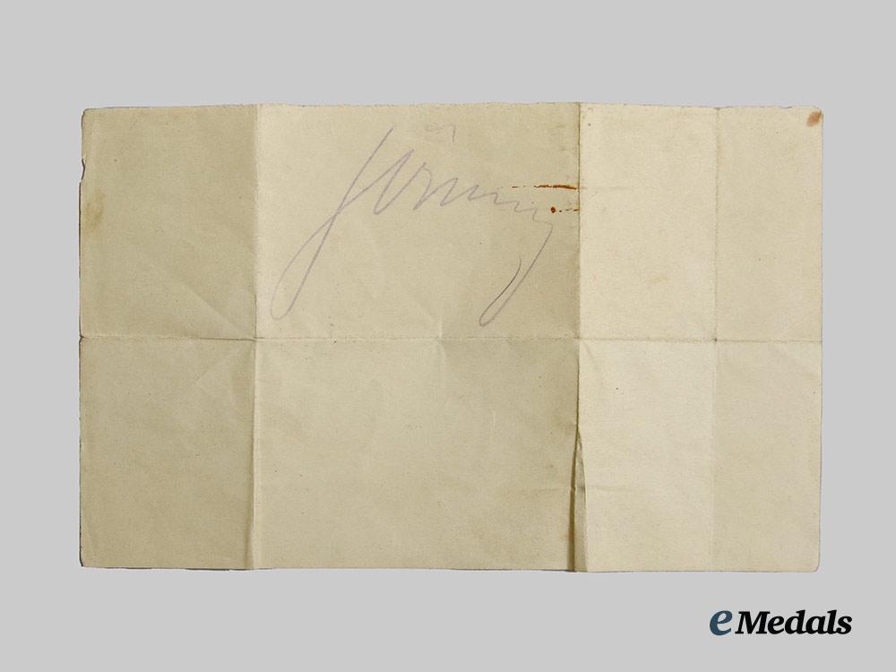 germany,_third_reich._a_signature_and_lot_of_three_photographs_of_hermann_göring_visiting_a_youth_hostel_on_the_island_of_sylt__a_i1_1393