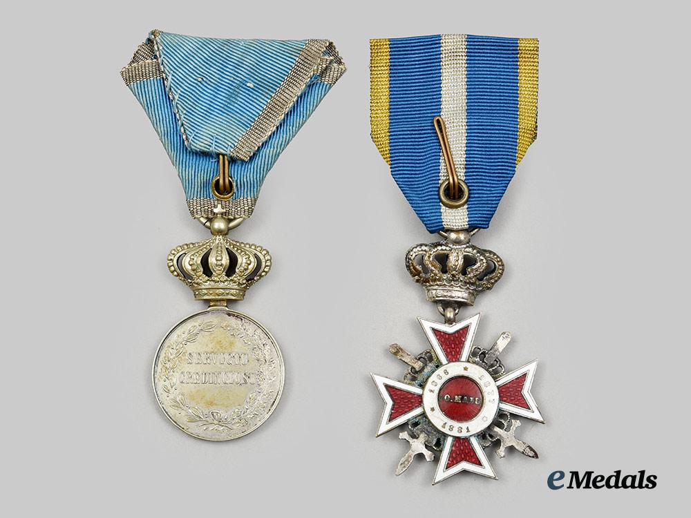 romania,_kingdom._an_order_of_the_crown_of_romania_v._class_with_swords_and_a_loyal_service_medal_i_i._class__a_i1_3057