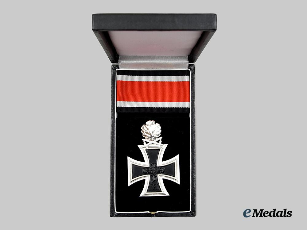 germany,_federal_republic._a_mint_cased_knight’s_cross_of_the_iron_cross_with_oak_leaves_and_swords,_by_s&_l,_c.1965__a_i1_3856
