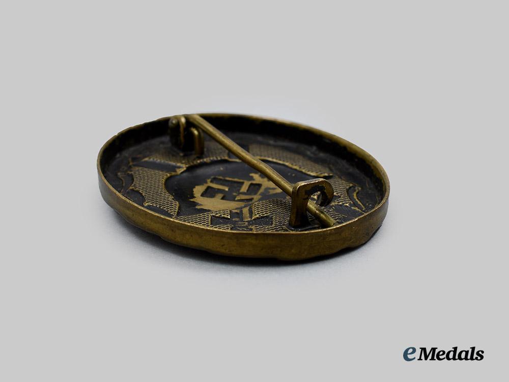 germany,_wehrmacht._a_pair_of_service_badges__a_i1_4257