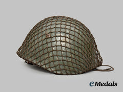 Italy, Kingdom. An M33 Steel Helmet, Owner-Attributed, with Net