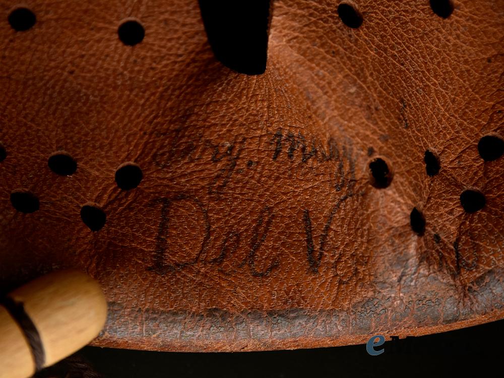 italy,_kingdom._an_m33_steel_helmet,_owner-_attributed,_with_net___m_n_c0064