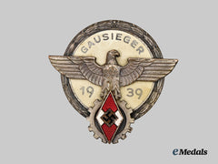 Germany, HJ. A 1939 National Trade Competition Victor’s Badge, Silver Grade, by Gustav Brehmer
