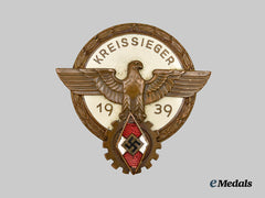 Germany, HJ. A 1939 National Trade Competition Victor’s Badge, Bronze Grade, by Ferdinand Wagner