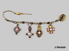 Austria, Imperial. A Miniature Chain with Four Decorations, c.1914
