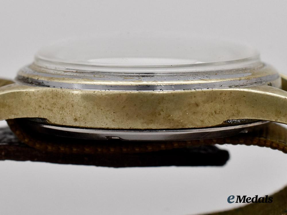 germany,_heer._a_serviceman’s_wristwatch,_by_grana,_allied_retrieval_from_buchenwald___m_n_c0344