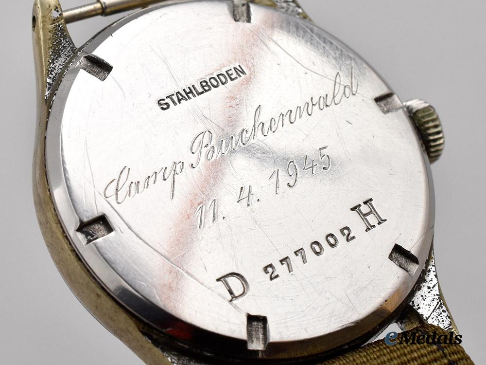 germany,_heer._a_serviceman’s_wristwatch,_by_grana,_allied_retrieval_from_buchenwald___m_n_c0345