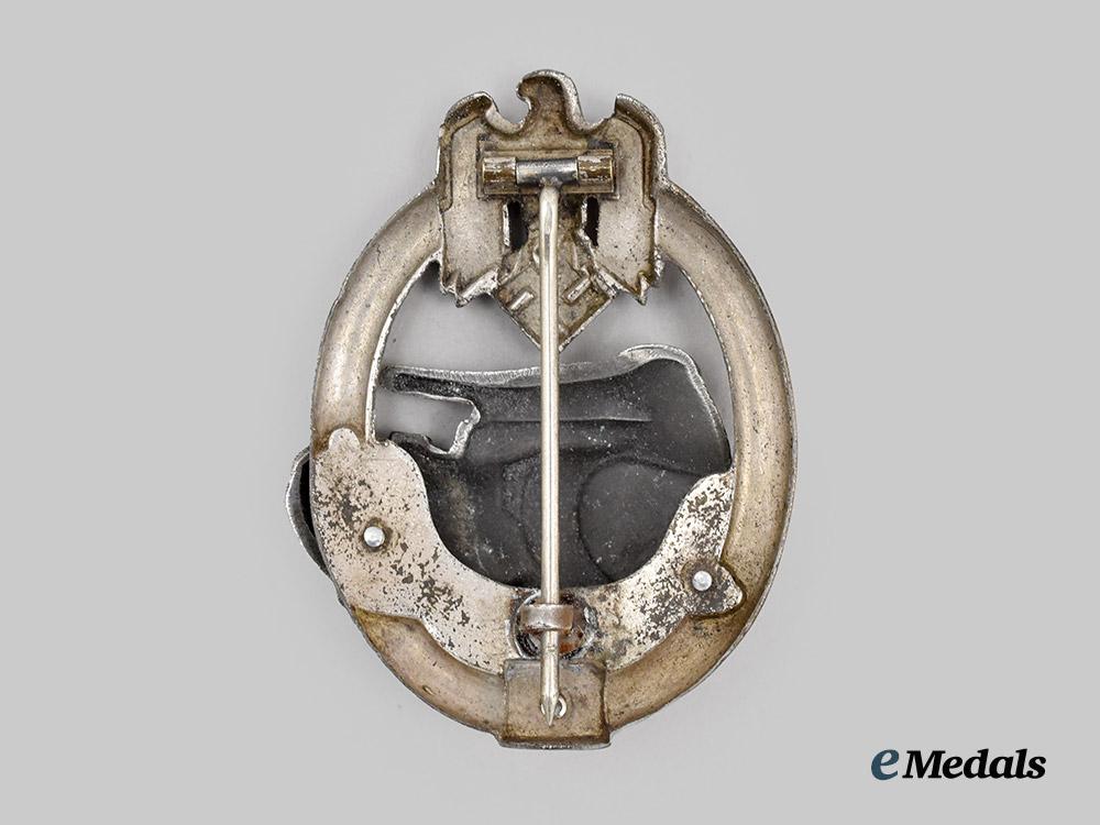 germany,_wehrmacht._a_panzer_assault_badge,_special_grade25,_transitional_semi-_hollow_variant_by_c._e._juncker___m_n_c0540