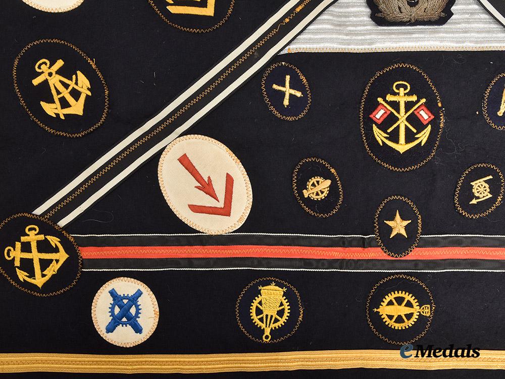 germany,_kriegsmarine._an_allied_souvenir_board_featuring_specialist_insignia_and_medal_ribbons___m_n_c0633
