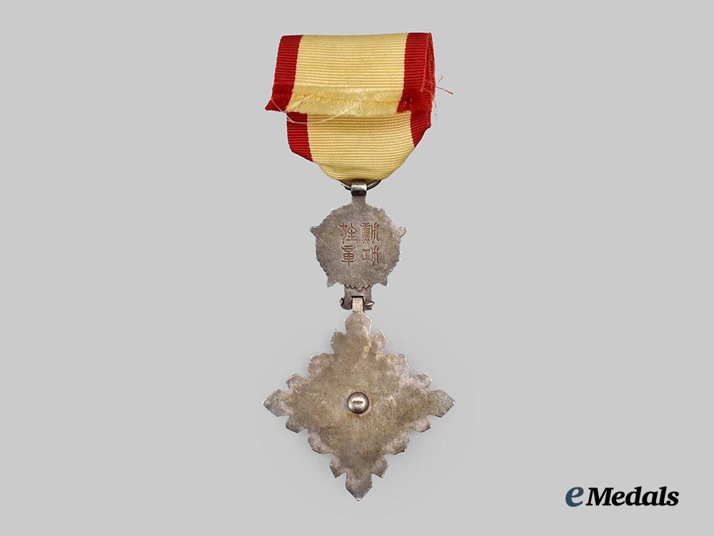 japan,_manchukuo_empire._an_order_of_the_auspicious_clouds,_sixth_class_badge___m_n_c0678