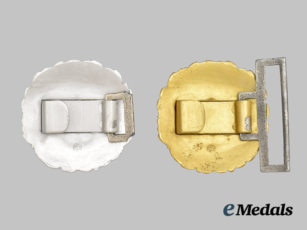 germany,_third_reich._a_group_of_two_kriegsmarine_officer’s_belt_buckles___m_n_c0810
