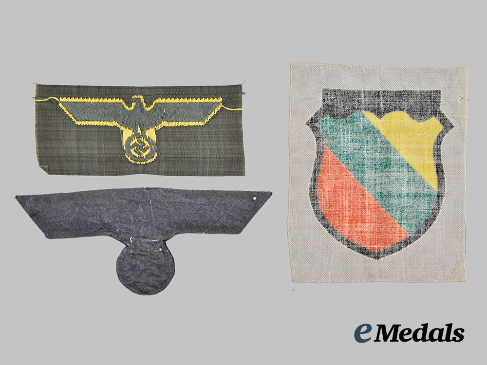 germany,_third_reich._a_group_of_three_mint_and_unissued_insignia___m_n_c1085