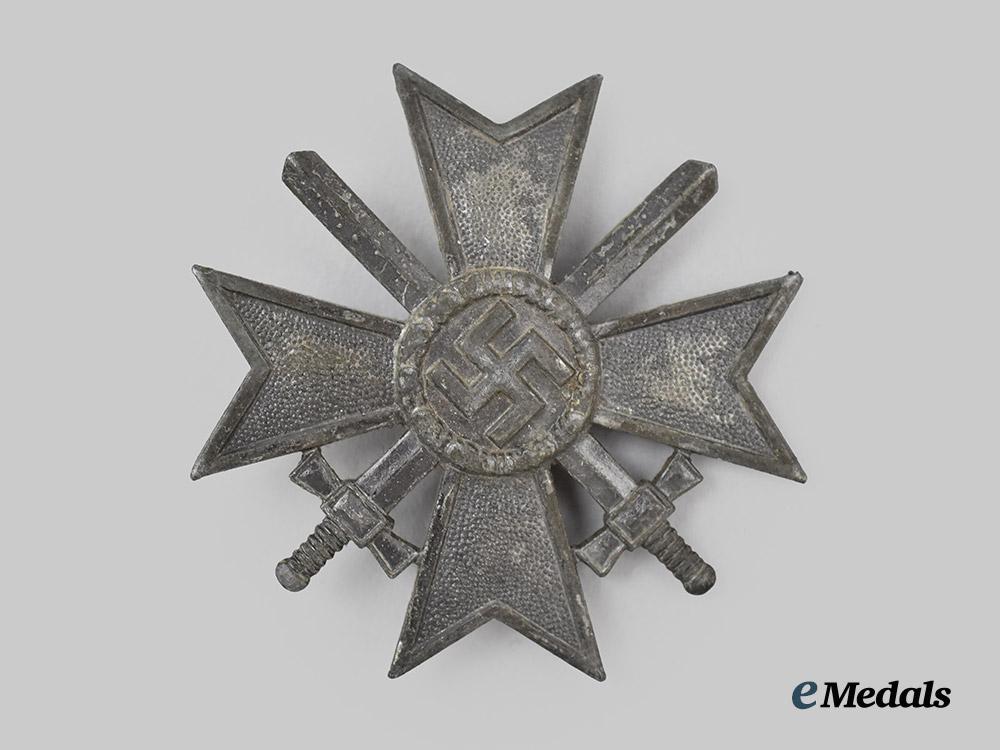 germany,_wehrmacht._a_war_merit_cross_i_class_with_swords_and_case,_late-_war_example_by_wilhelm_deumer___m_n_c1262
