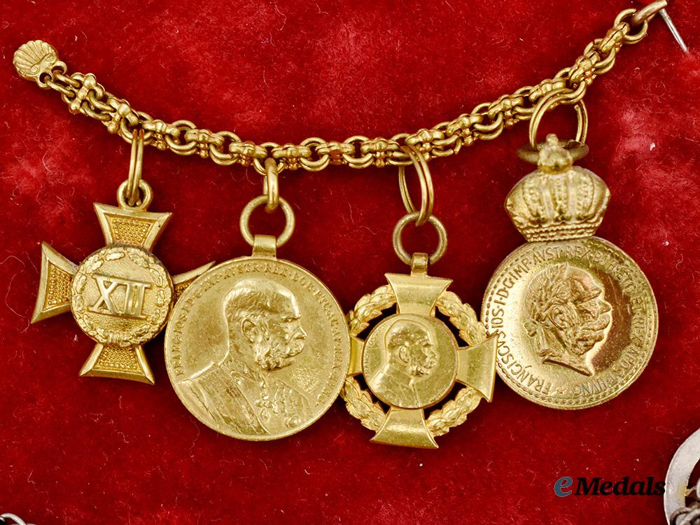 austria,_imperial._a_pair_of_framed_miniature_medal_chains___m_n_c1622