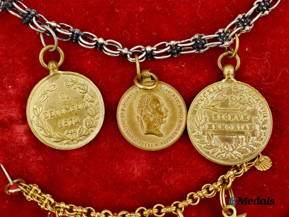 austria,_imperial._a_pair_of_framed_miniature_medal_chains___m_n_c1623