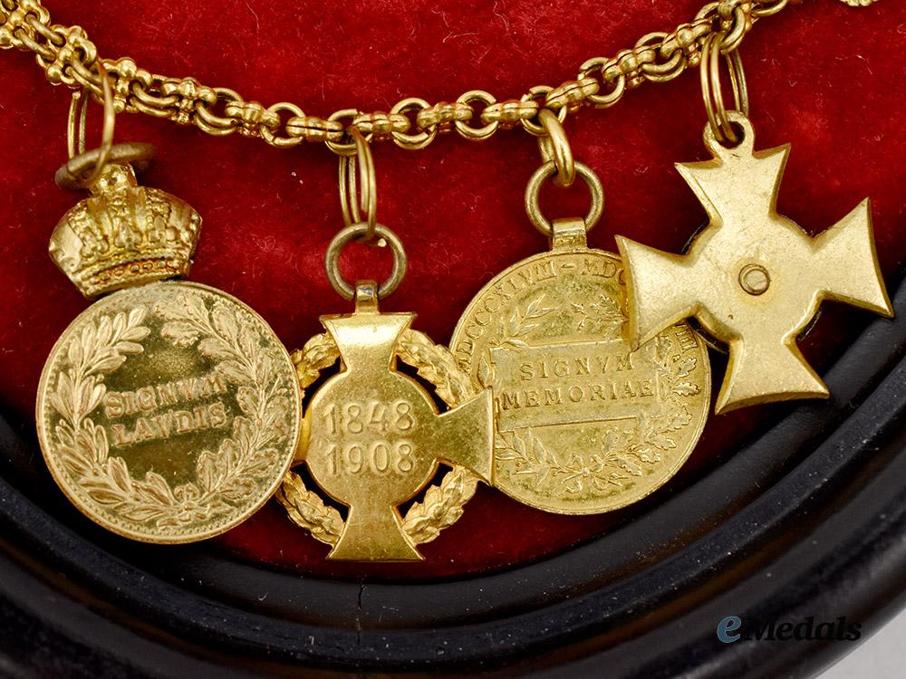 austria,_imperial._a_pair_of_framed_miniature_medal_chains___m_n_c1624