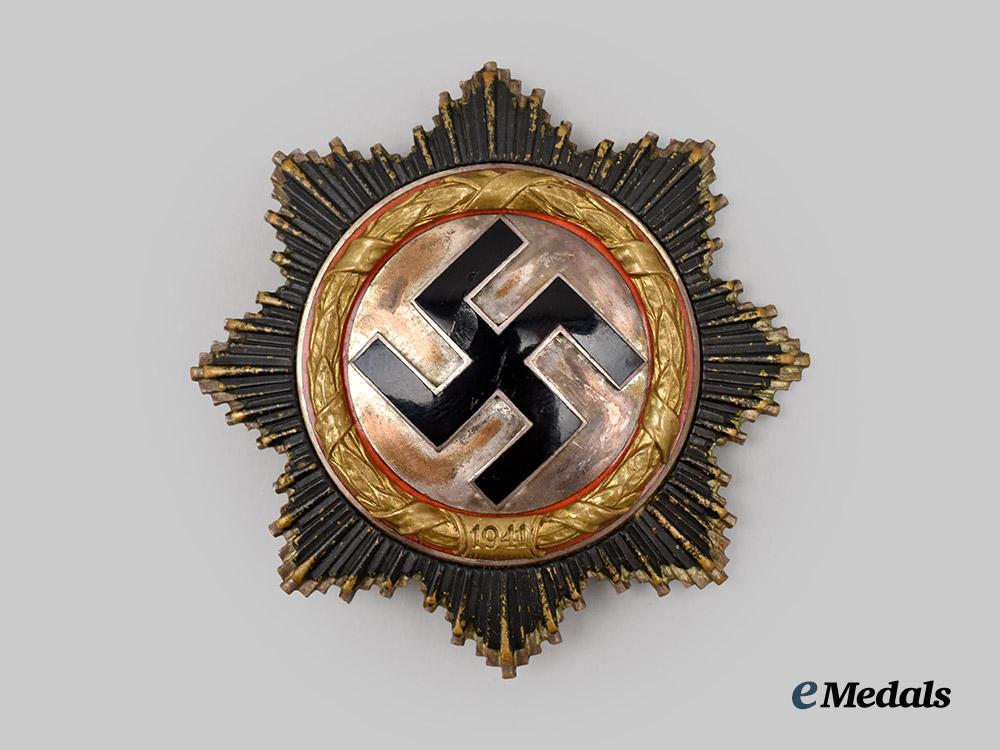 germany,_wehrmacht._a_rare_german_cross_in_gold,_heavy_version,_by_c._e._juncker___m_n_c1709