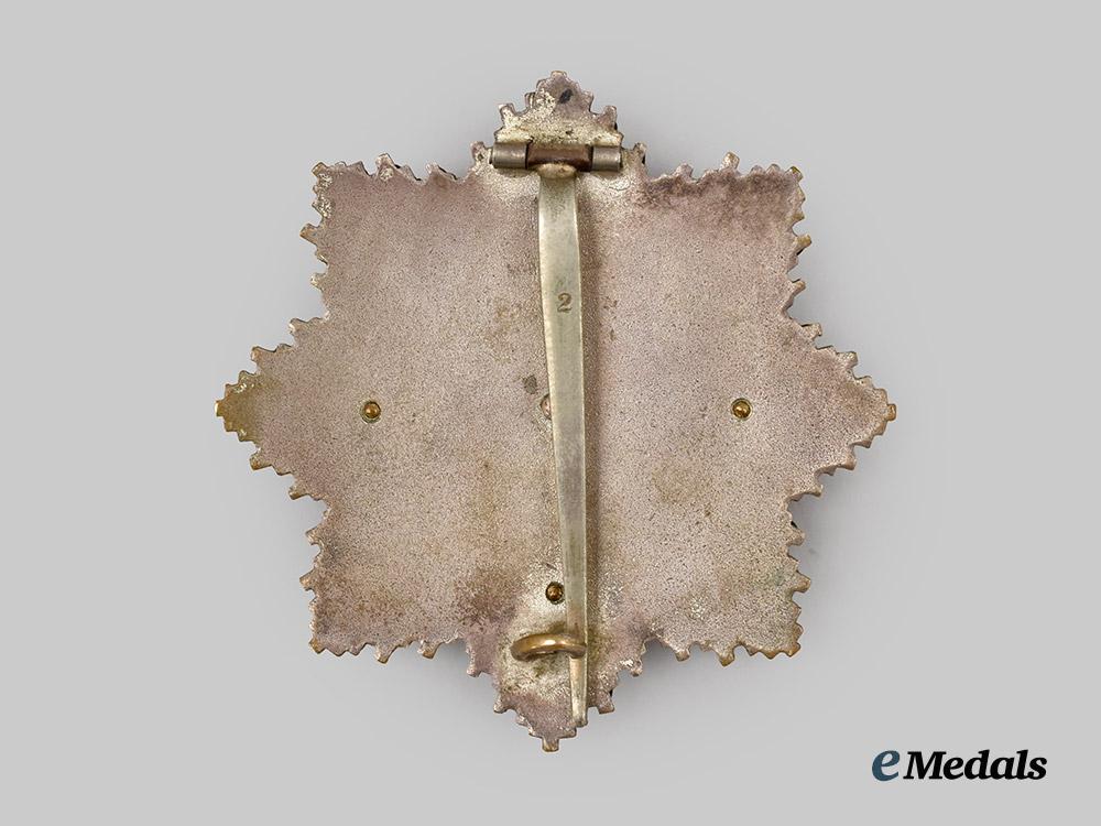 germany,_wehrmacht._a_rare_german_cross_in_gold,_heavy_version,_by_c._e._juncker___m_n_c1711