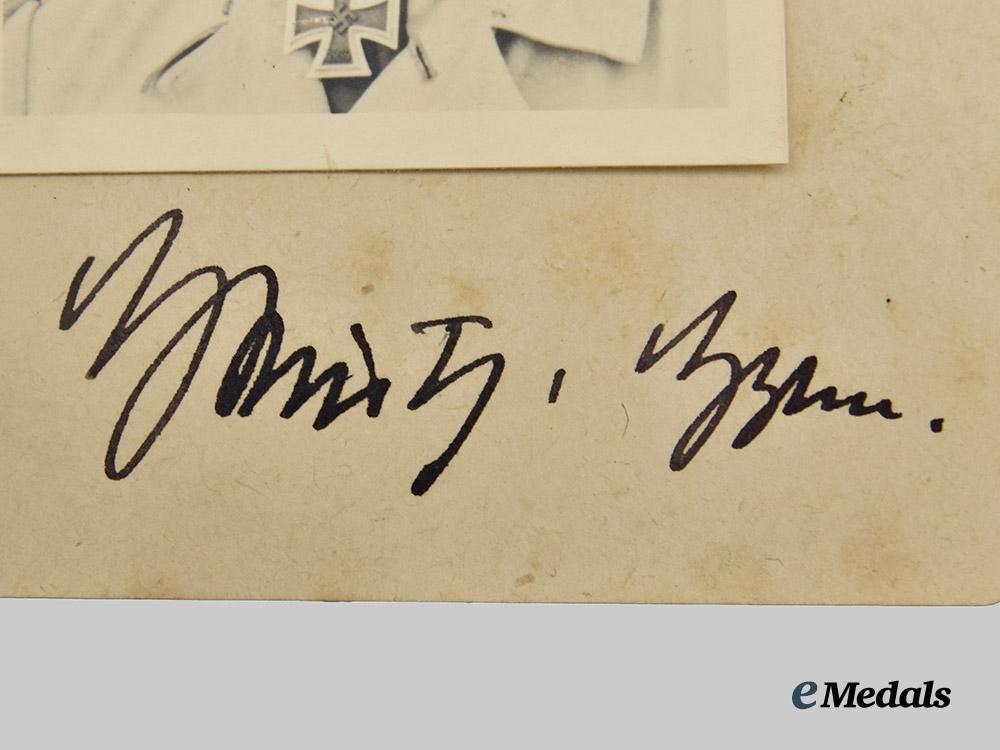 germany,_luftwaffe._a_lot_of_private_photos_of_luftwaffe_bomber_ace_kurt_heintz,_knight’s_cross_of_the_iron_cross,_with_signature___m_n_c1811