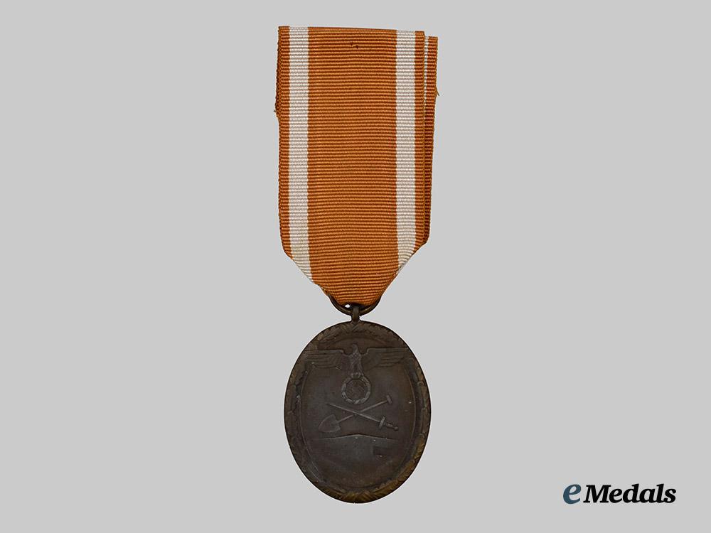 germany,_third_reich._a_west_wall_medal,_with_package,_by_carl_poellath___m_n_c2220