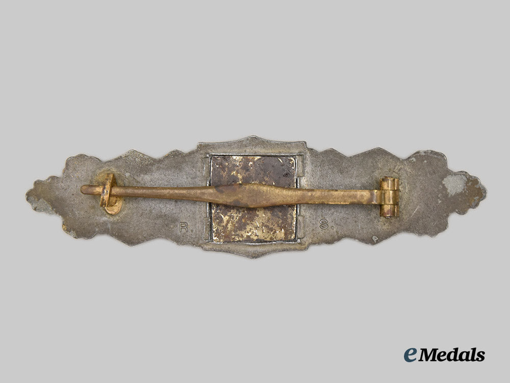 germany,_third_reich._a_close_combat_clasp,_gold_grade,2nd_pattern,_by_rudolf_souval,“_fat_bellied_pin&_thickwire_catch”_version___m_n_c2518