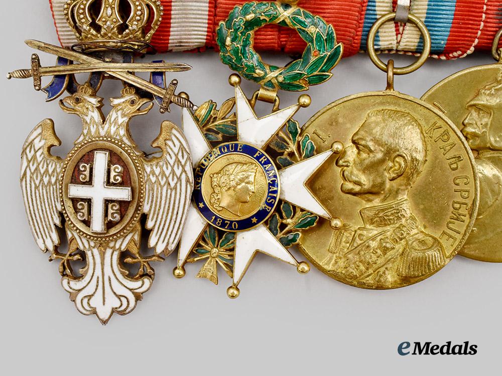 serbia,_kingdom._a_serbian_medal_bar_of_nine_decorations___m_n_c2744