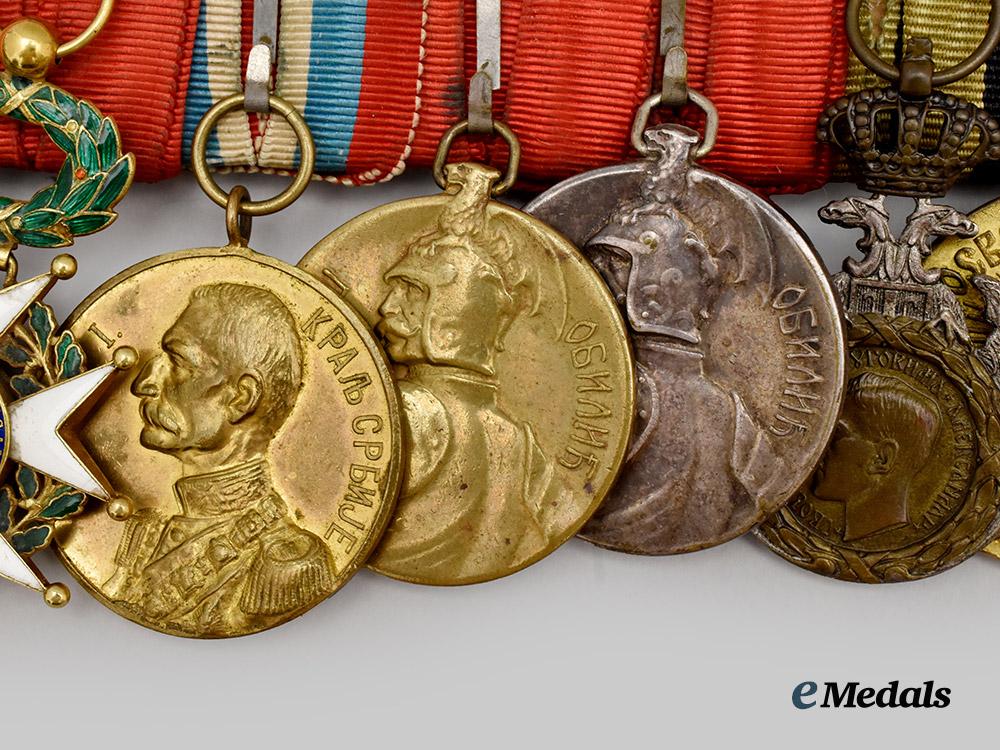 serbia,_kingdom._a_serbian_medal_bar_of_nine_decorations___m_n_c2745