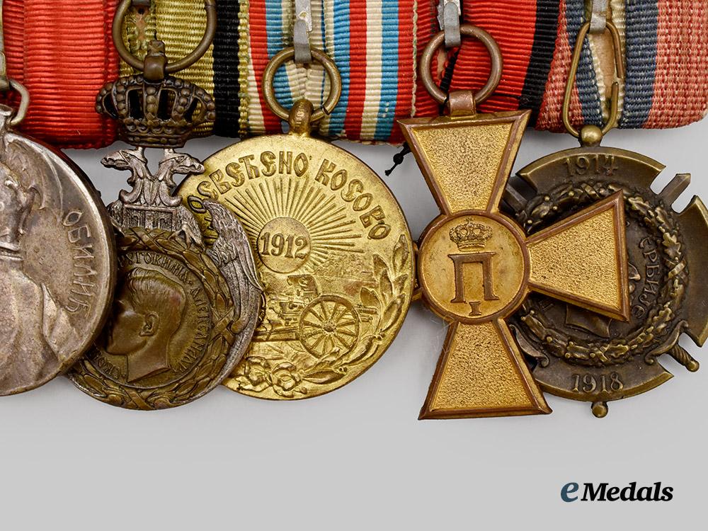 serbia,_kingdom._a_serbian_medal_bar_of_nine_decorations___m_n_c2746