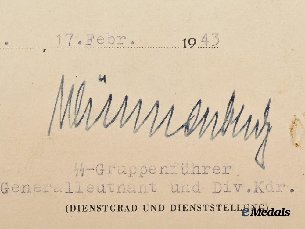 germany,_s_s._a1939_iron_cross_i_i_class_award_document_to_unteroffizier_karl_schulz,_s_s-_polizei-_grenadier-_regiment2___m_n_c2954