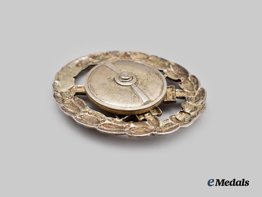 germany,_imperial._a_rare_silver_grade_wound_badge,_cut-_out_screwback_version___m_n_c3003