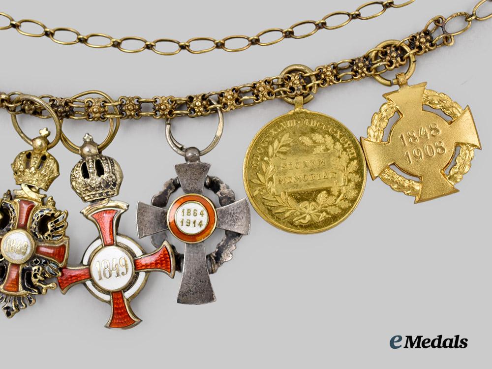 austria,_imperial._a_fine_chain_of_miniature_imperial_orders_by_vincent_mayer,_in_gold,_with_case___m_n_c3101