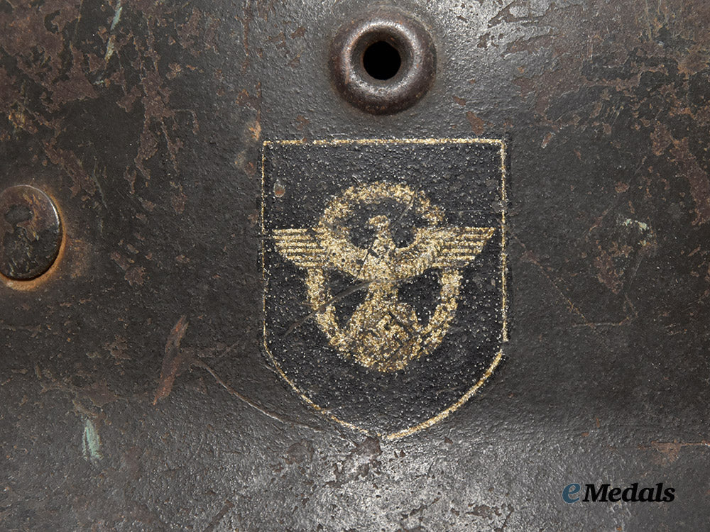 germany,_ordnungspolizei._an_m40_stahlhelm,_double_decal_and_owner-_attributed_example,_by_f._w._quist___m_n_c3134