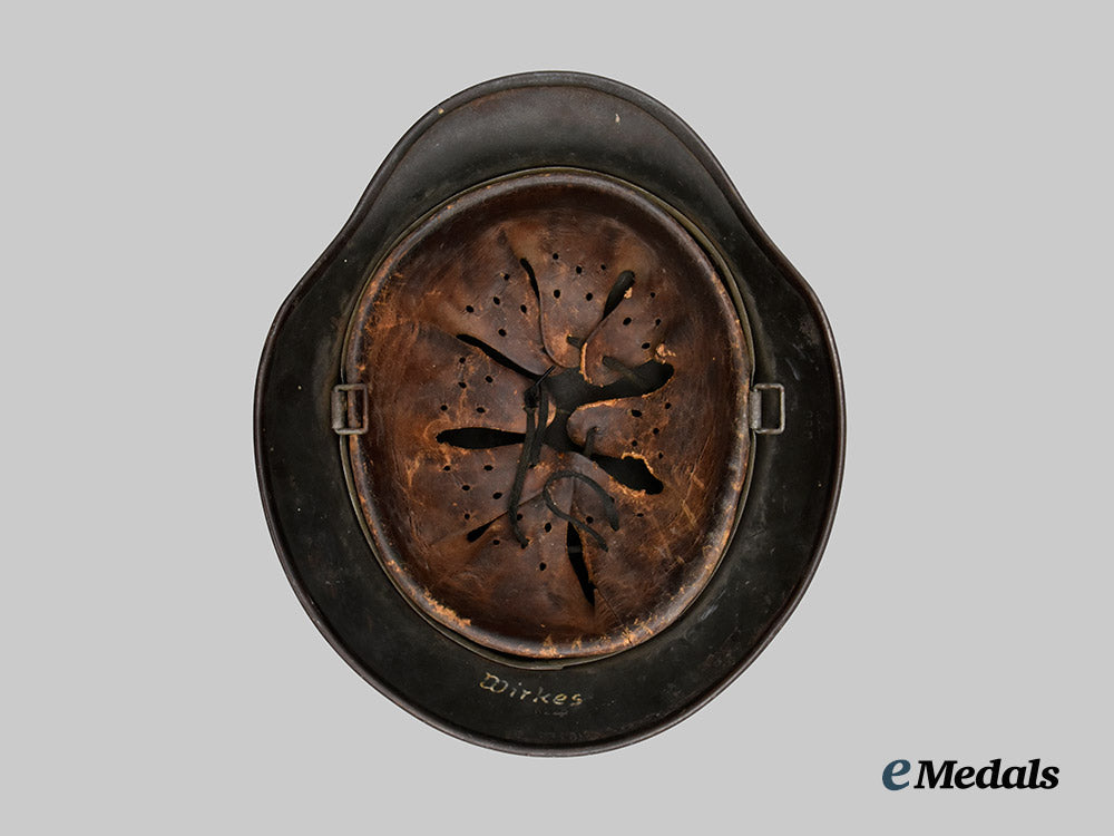 germany,_ordnungspolizei._an_m40_stahlhelm,_double_decal_and_owner-_attributed_example,_by_f._w._quist___m_n_c3135