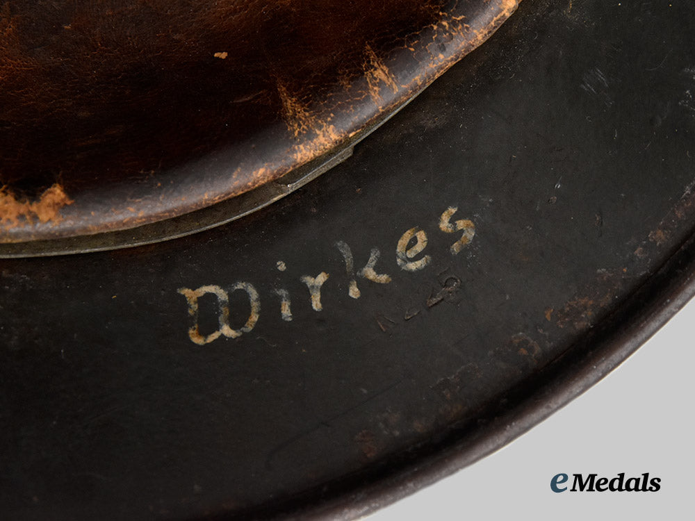 germany,_ordnungspolizei._an_m40_stahlhelm,_double_decal_and_owner-_attributed_example,_by_f._w._quist___m_n_c3136