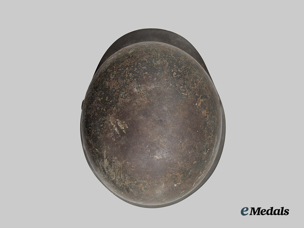 germany,_ordnungspolizei._an_m40_stahlhelm,_double_decal_and_owner-_attributed_example,_by_f._w._quist___m_n_c3137