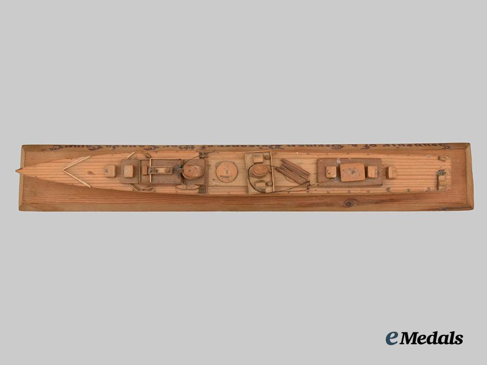 germany,_wehrmacht._a_model_battleship_hand-_carved_in_gravenhurst_p_o_w_camp___m_n_c3138