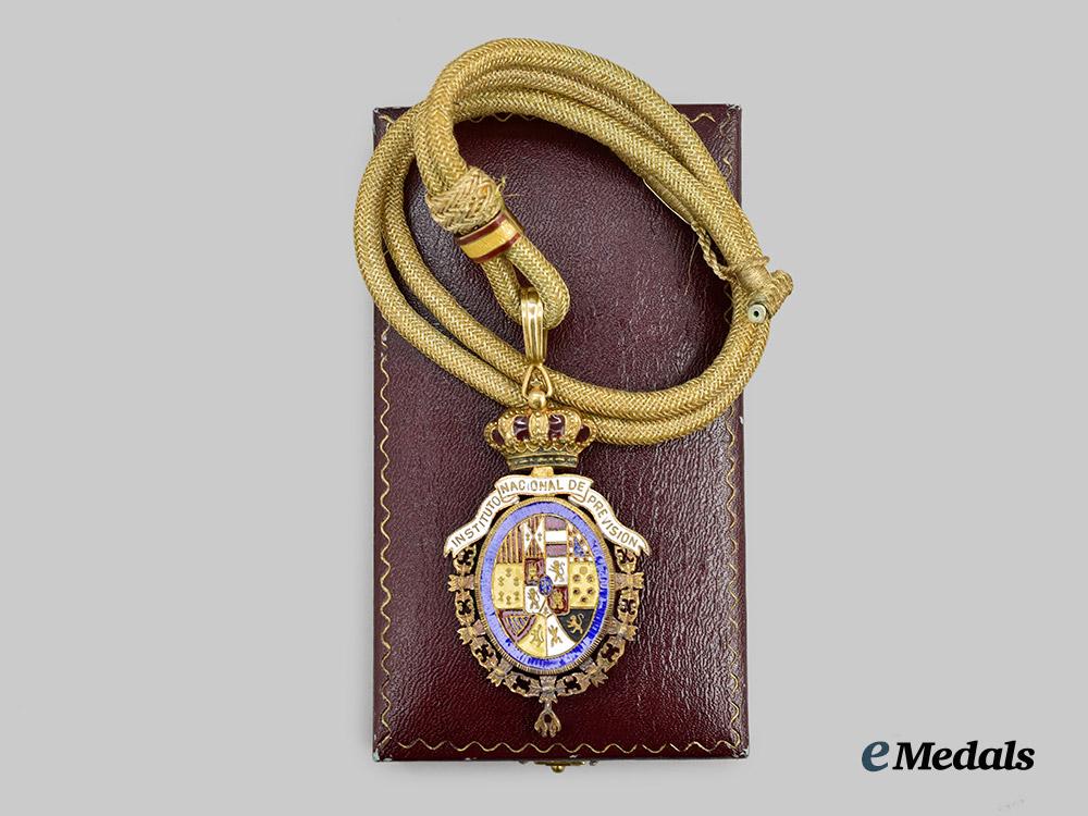 spain,_kingdom._a_decoration_of_the_national_institute_of_social_security,_by_villanueva_u_j_o_y_e_r_o_s___m_n_c3466